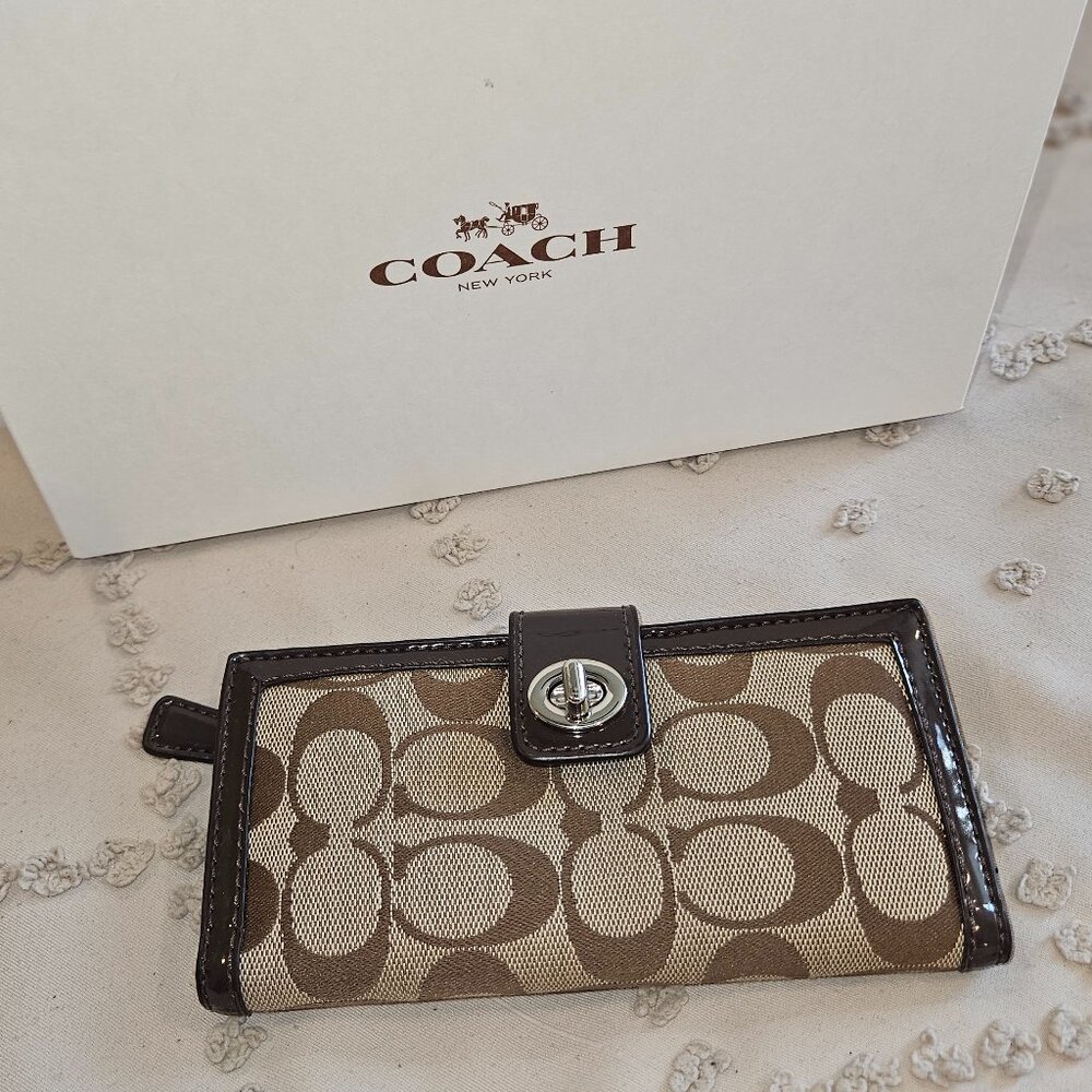 Coach bifold Wallet with front twist lock